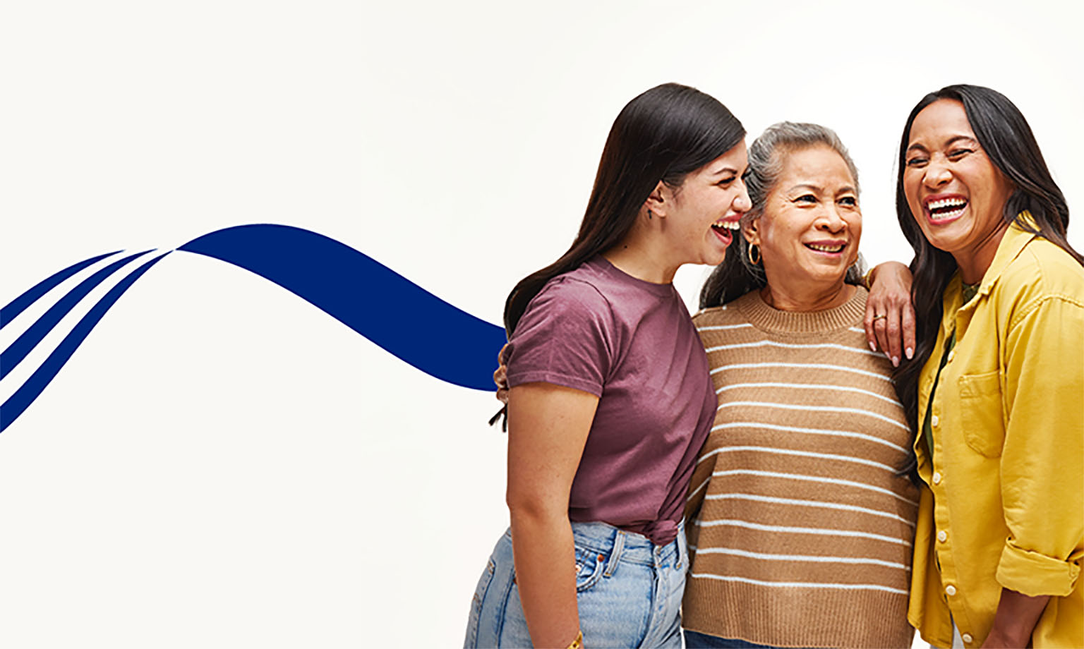 Three women hear each other laugh together - helping illustrate the UnitedHealthcare commitment to meeting patients' hearing health care needs